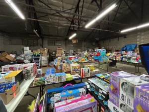 Volunteers organizing donated toys for children in need