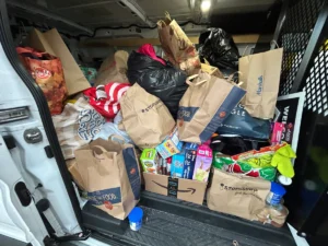 Donations being packed for delivery to local shelters