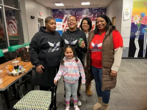 Group of volunteers planting trees in community park